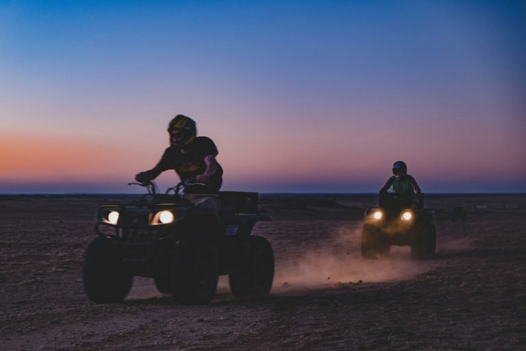 Two riders on ATVs