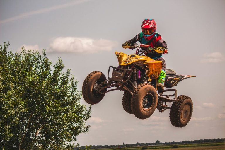 Rider on a yellow ATV