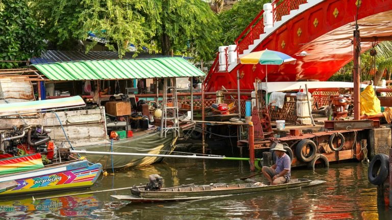 Rowing through a bustling floating market
