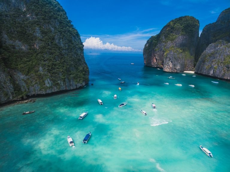 Boats in the turquoise water of Maya Bay
