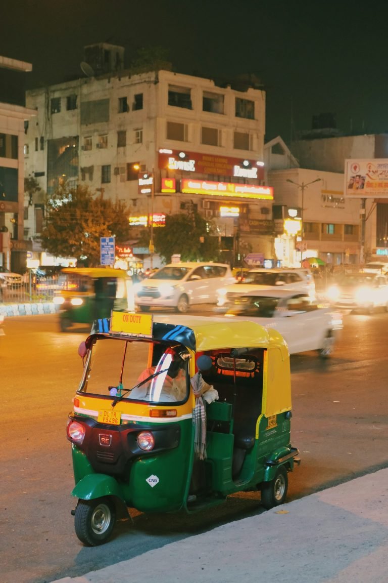 Tuk-tuk on the road at night