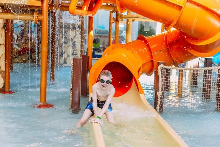 Child on a water slide