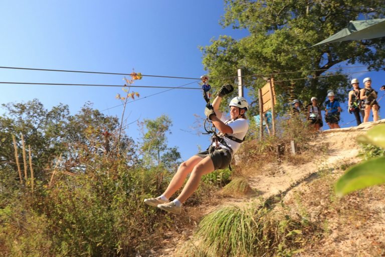 Zipline over a green hillside